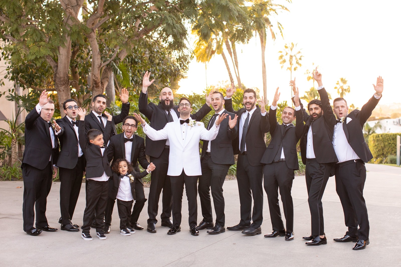 groom and groomsmen black suits